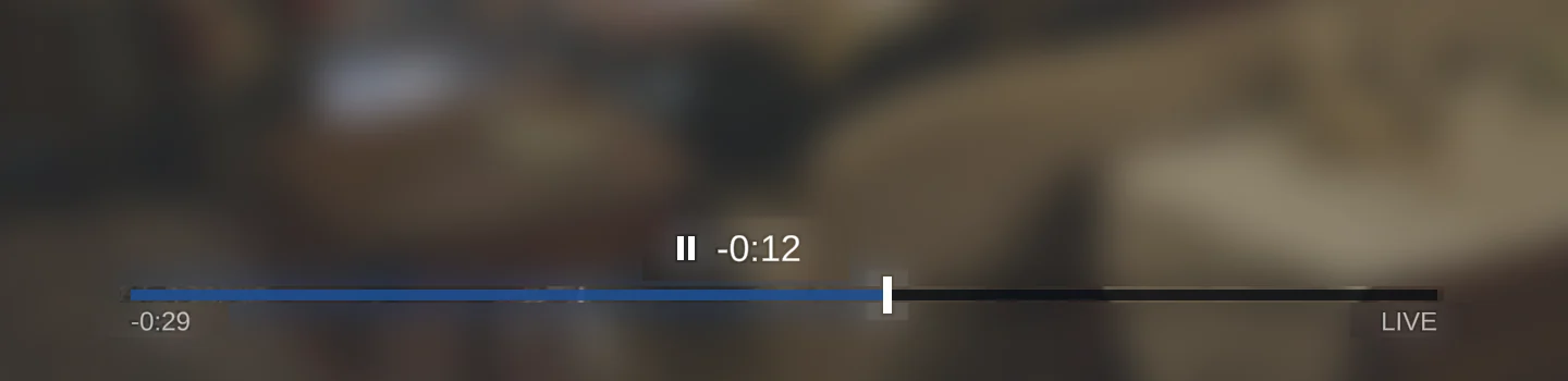 The bottom of a paused TV programme, with the Live Pause timeline showing the picture paused 12 seconds behind live.